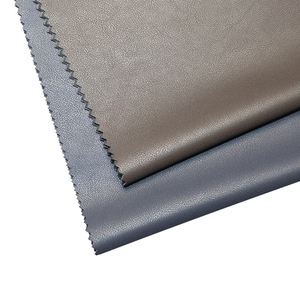 Entretela de cuero PU tejida por proceso húmedo para ropa, tela suave, ecológica y de color sólido. - Product Image 1