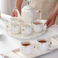 Ensemble de carafes à eau froide en porcelaine blanche de luxe, ensemble de vaisselle haut de gamme, ensemble de tasses et de cafetières noires, ensemble de thé de qualité supérieure pour la maison