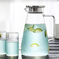 Carafe à eau en verre résistant à la chaleur de 1,8 L, en verre borosilicate de haute qualité, avec couvercle en acier inoxydable et facile à nettoyer pour la maison