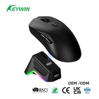 OEM ODM Lightweight Tri-Mode Gaming Mouse 12000 DPI RGB Custom Esports Mouse with Charging Base Stock Lightweight Gaming Mouse