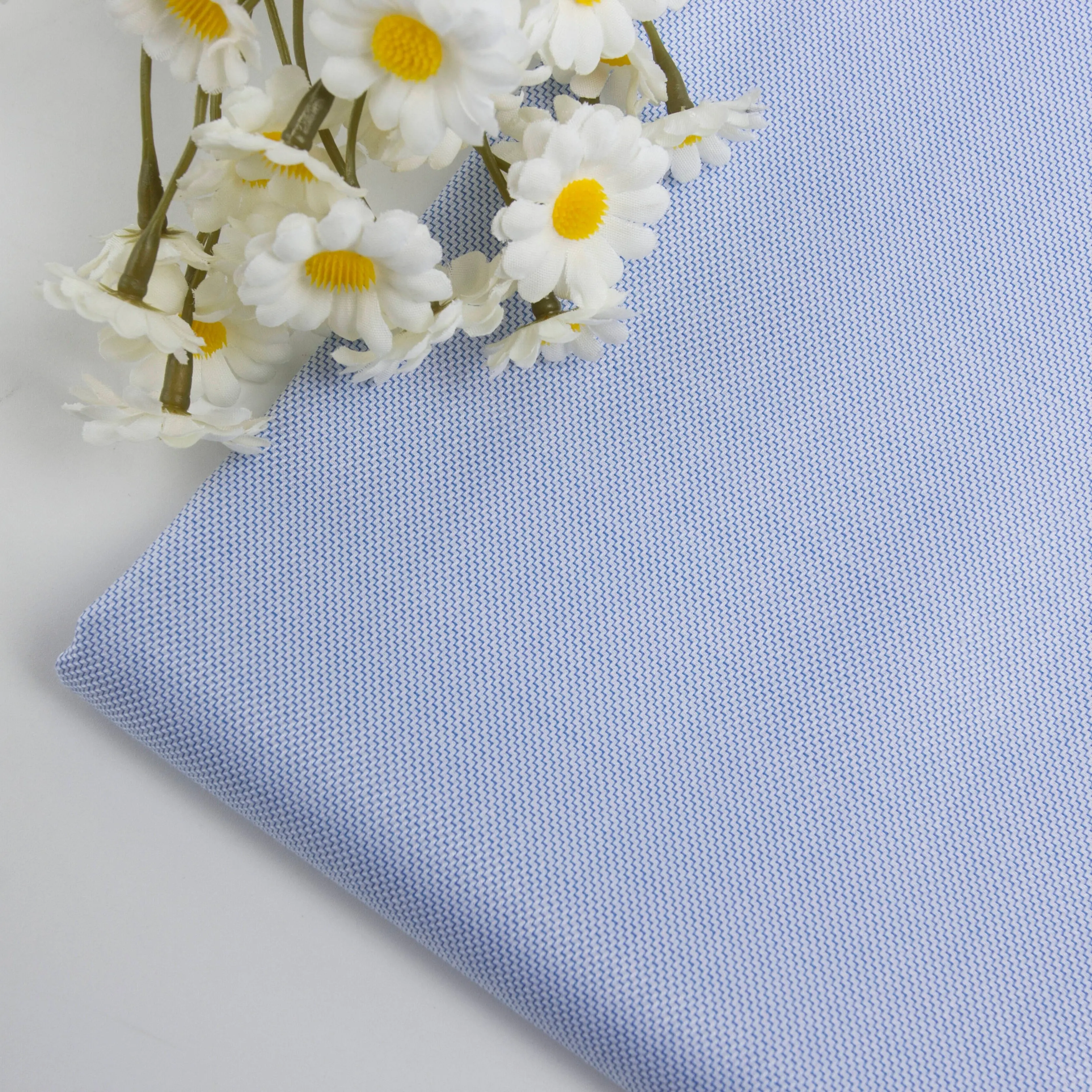 94 China textil antiarrugas azul y blanco amoníaco líquido onda 100 algodón tejido camisa tela para prendas de lujo