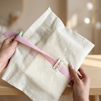Pochette de luxe en tissu de coton doux avec nœud en ruban, petite pochette à bijoux, pochette textile personnalisée avec logo, prix d'usine