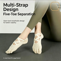 Chaussettes de yoga professionnelles à cinq orteils, chaussettes de Pilates antidérapantes à 4 sangles croisées, chaussettes à semelle en silicone antidérapante pour femmes