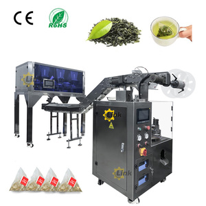 Máquina automática de embalaje de té de bolsas triangulares Máquina de llenado de bolsas de té de nailon Telas no tejidas Máquina de embalaje de bolsas de té - Product Image 1