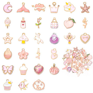 Colgante Clásico Infantil en Forma de Estrella de Aleación Chapada en Oro con Zirconia Rosa y Esmalte Goteado, Accesorios de Joyería DIY - Product Image 1