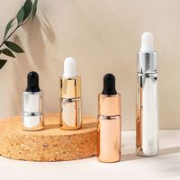 2-10ml Glas-Elektroplattierte Tropfflasche Gold Silber Klar Bernsteinfarben Ätherisches Öl Hautpflege-Creme Konzentratflasche