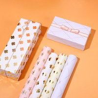Feuille de papier d'emballage cadeau en feuille métallique de luxe avec hexagramme de coeur de trèfle à quatre feuilles imprimé