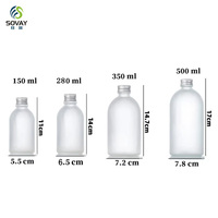 Bouteilles de boissons en verre rondes transparentes et givrées sur mesure de 150 ml, 280 ml, 350 ml, 500 ml pour jus et kombucha avec bouchons à vis