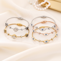 Bracelet manchette en acier inoxydable OEM, motif œil turc bleu coloré et flocon de neige, pour femme, vente en gros
