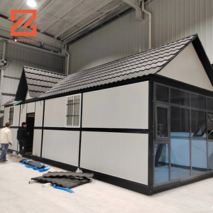 Vietnam <span class=keywords><strong>japonais</strong></span> 2 étages résistant aux ouragans maison préfabriquée Triangle toit fait durable <span class=keywords><strong>panneau</strong></span> sandwich en acier pliant conception de conteneur - Product Image 1