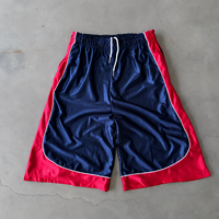 Shorts de basketball amples pour hommes, personnalisables OEM/ODM, en polyester lisse avec passepoil contrastant, fabricant de marque privée