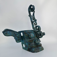 Sanxingdui Bronze tête humaine couronne artefact mis au jour caractéristiques culturelles artistiques uniques ruines artisanat en métal distingué