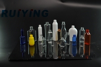 Machine de soufflage de bouteilles en plastique semi-automatique à bas prix, 2 cavités, 2 L, pour la fabrication de bouteilles d'eau en PET