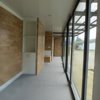 Meilleures ventes : Restaurant-bar modulaire préfabriqué en conteneur 20' 40', showroom à faible coût, panneau sandwich en acier, design industriel pour magasin