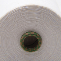 Fil à coudre 100% polyester filé, 30/32 NE, haute ténacité, teint en masse, pour la confection de t-shirts et de chemises