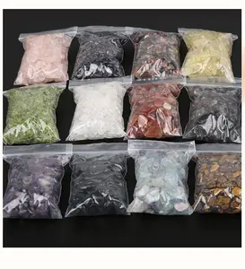 Commercio all'ingrosso all'ingrosso naturale molti tipi di cristalli di quarzo pietre curative pacchetto di sacchetti di PE pietre burattate di ghiaia di cristallo per la decorazione domestica