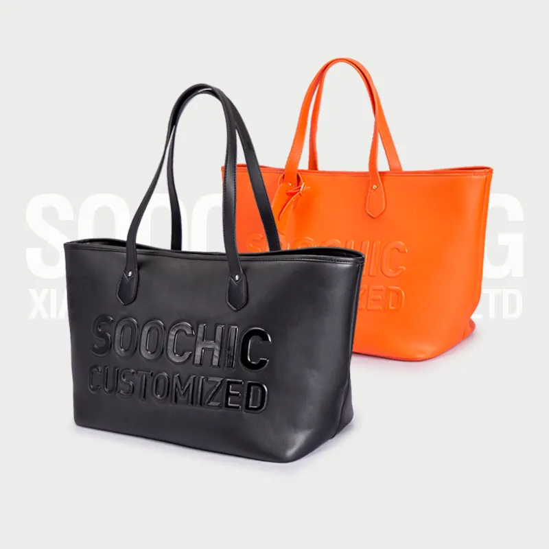 Yüksek kaliteli OEM özel kabartmalı Logo deri siyah Tote çanta kadınlar için çantalar