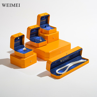 Boîte à bijoux WEIMEI, boîte à bijoux de luxe octogonale en cuir PU orange, emballage personnalisé pour bague, boucles d'oreilles, diamants, boîte à bijoux avec lumière