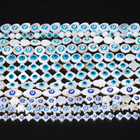Vente en gros de perles intercalaires en vrac pour la fabrication de bijoux DIY, formes multiples, fond blanc, yeux bleus, perles de corail en os pour collier