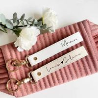 Porte-clés en cuir PU durable avec sangle renforcée, anneau métallique, texture épaisse pour ornement de sac à dos en cuir PU, style extérieur, choix de style