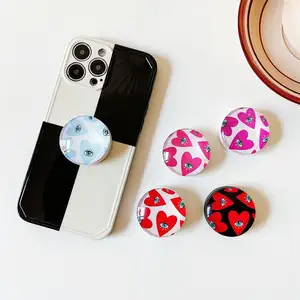 Popular Foldable Acrylic Phone Socket Grips Customized Phone Grip With Evil Eyes Design Acrylic Epoxy Phone Holders