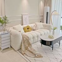 Canapé une place en tissu nordique de style français, couleur crème, en forme de guimauve, petit format, design tendance, en laine d'agneau, rembourré en éponge