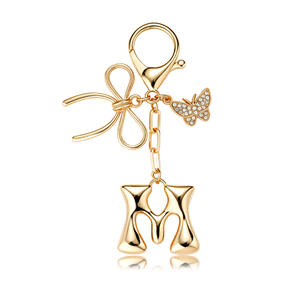 Llavero de metal con letras y mariposas Uionen, accesorio colgante para bolso - Product Image 5