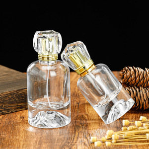 Wholesale In Stock 50ml 100ml Transparent Glass Press Spray <b>Perfume</b> Bottle High-Grade Round Fragrance Refillable <b>Container</b> - Product Image 1