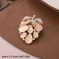 Broche de mode pour femme, ornée de strass effet diamant et de pierres œil de chat en forme de fleur, pour corsage et revers, accessoires vestimentaires