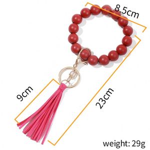 Wholesale Modern Handmade Wooden <b>Key</b> Ring Large Wood Beads Keychain Bracelets with Suede <b>Tassel</b> and Offset Printing - Product Image 2
