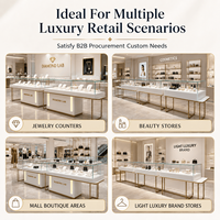 Vitrine de présentation de bijoux en verre blanc et acier inoxydable avec éclairage LED, comptoir de luxe robuste, mobilier de vente au détail sur mesure pour boutique