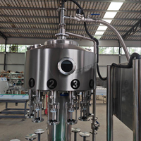Machine de remplissage rotative à basse pression réglable de 50 à 5000 ml, trémie SUS304, remplissage automatique pour l'industrie alimentaire et des boissons