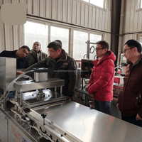 Machine automatique de fabrication de pain tortilla à la farine machine automatique à lavash ligne de production de tortilla machine à pain saj machine à tacos