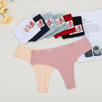 Vente en gros de culottes string en coton de taille mixte pour jeunes filles sexy string de couleur unie de taille basse dans une douzaine de paquets de 12 couleurs multiples et unies