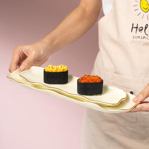 2025 assiettes en céramique de porcelaine nordique Style de luxe léger assiette à <span class=keywords><strong>Sushi</strong></span> irrégulière bordure dorée plat rectangulaire assiette en céramique Prato - Product Image 4