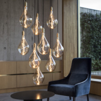 Ampoule LED à filament Edison géante de forme extraterrestre surdimensionnée 220 mm 180 mm à intensité variable 4W 2200K pour la décoration d'hôtel