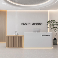 Bureau de réception moderne en forme de L avec LED et finition brillante, design minimaliste à bords incurvés pour salons de beauté, cliniques ou bureaux d'entreprise