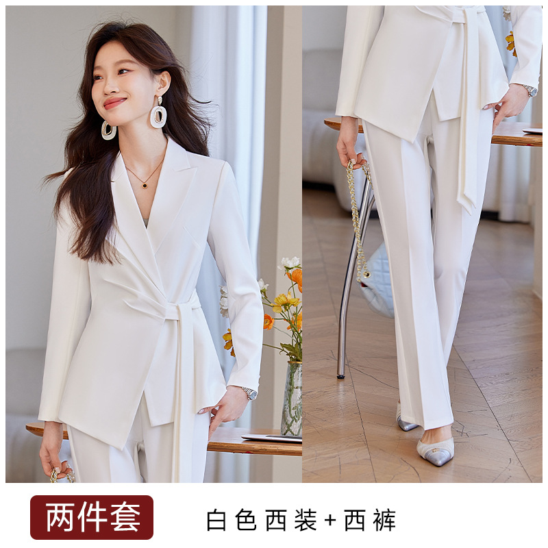 White suit with slightly flared trousers