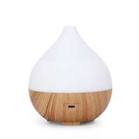 Diffuseur d'aromathérapie d'humidificateur d'air léger coloré de grain de bois