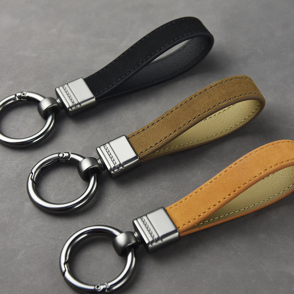 Wholesale Promotional Genuine Leather Custom Logo Keyring Key Holder Key  Chain Cow Stamped Leather Car Key Chains for Women Men