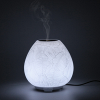 Diffuseur d'arômes en résine pour la maison, feuille de banane ronde de 150 ml, avec lumière nocturne à 7 couleurs, ODM OEM