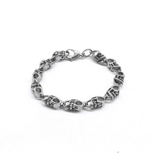yunnique Pulsera con forma de calavera de acero de titanio, diseño geométrico unisex, joyería de moda - Product Image 1