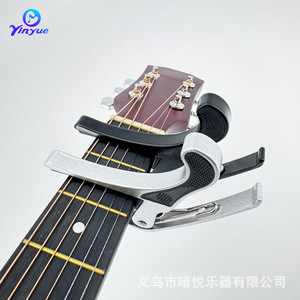 Capo para ukelele, abrazadera ajustable de plástico y acero para accesorios de guitarra y ukelele - Product Image 3