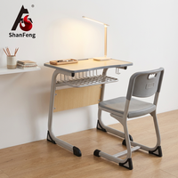 Ensemble de mobilier scolaire ergonomique moderne avec chaise et bureau de classe en MDF, structure métallique de 1,5 mm, durable, pour université et chambre.