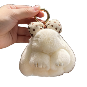 CHENXI Vente en gros Porte-clés en peluche 3D doux en forme de lapin de dessin animé avec pompon pour voiture et sac - Product Image 1
