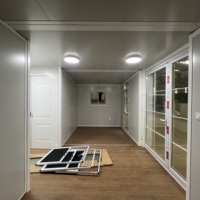 Villa de luxe à deux étages, duplex, maison conteneur de 40 pieds, extensible, préfabriquée, moderne, avec un design intérieur entièrement meublé