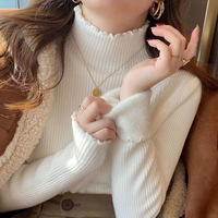 Pull d'hiver doux et confortable pour femme - Pull en maille épaisse doublé polaire avec un haut court et une doublure intérieure