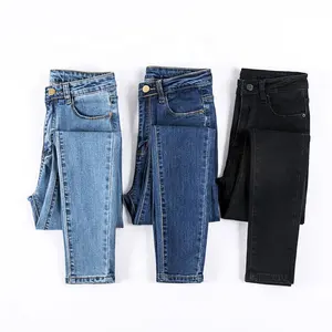 2023 Women's fashion plus size washed thin knee-length ripped bell-bottom pants and fringed denim trousers