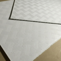 Plaque de plâtre stratifiée PVC 600x600, résistante à l'humidité, insonorisée, ignifuge, design artistique pour usage hôtelier, projet suspendu