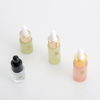 Flacon compte-gouttes en verre rond translucide rose de 10 ml vide pour l'emballage de sérum de soin de la peau